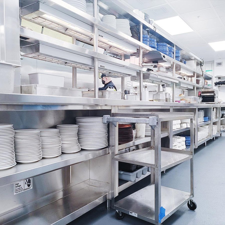 commercial-shelving-and-carts Commercial shelving and transportation in the back of a restaurant. Restaurant equipment and items that can be purchased at Central Florida Restaurant Supply.